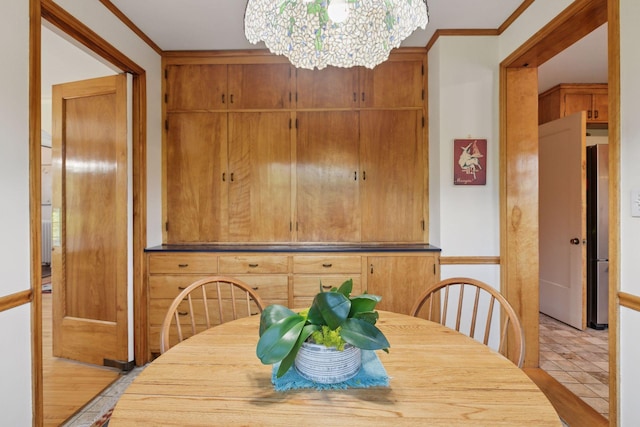 2924 Farwell Ave, Minneapolis, MN 55411 - dining space with a chandelier and crown molding