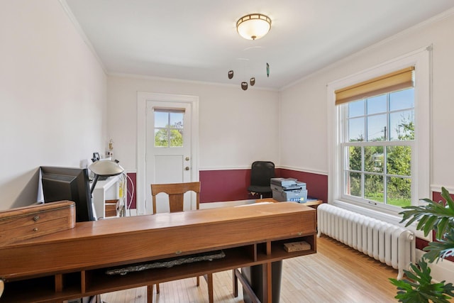 2924 Farwell Ave, Minneapolis, MN 55411 - office area featuring radiator, plenty of natural light, ornamental molding, and light wood-type flooring