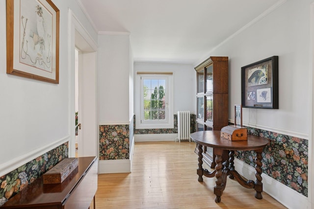 2924 Farwell Ave, Minneapolis, MN 55411 - office area with radiator heating unit, wood finished floors, baseboards, and crown molding