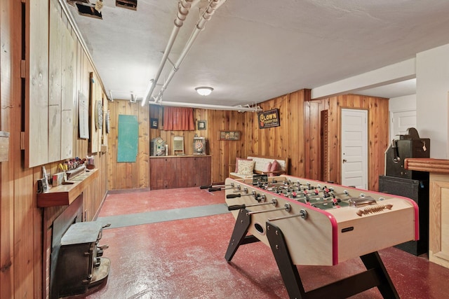 2924 Farwell Ave, Minneapolis, MN 55411 - rec room with wood walls and concrete floors