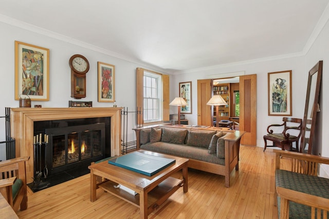 2924 Farwell Ave, Minneapolis, MN 55411 - living room featuring a fireplace with flush hearth, light wood-type flooring, and crown molding