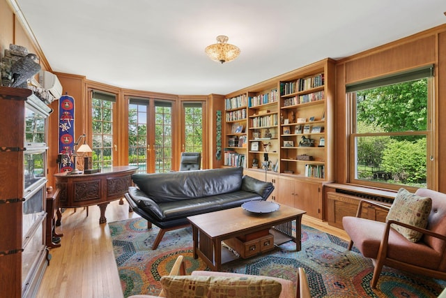 2924 Farwell Ave, Minneapolis, MN 55411 - living area featuring healthy amount of natural light, french doors, and wood finished floors
