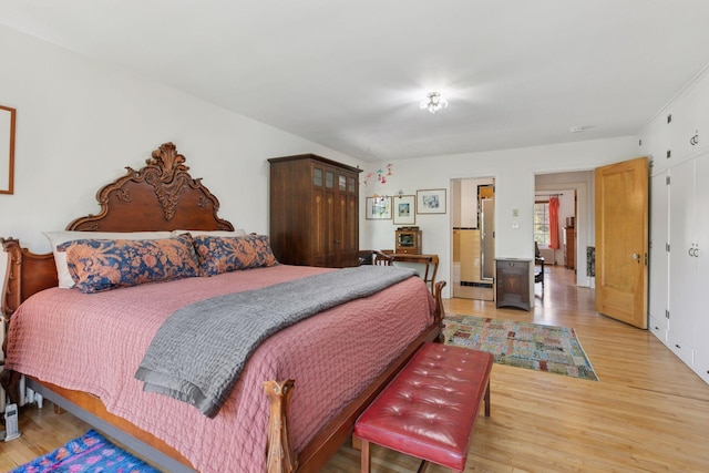 2924 Farwell Ave, Minneapolis, MN 55411 - bedroom featuring light wood-type flooring