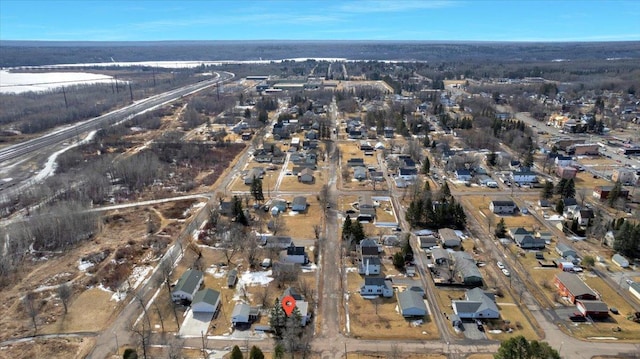 aerial view of property's location featuring nearby suburban area