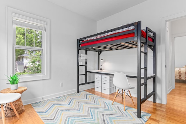 1597 James Ave, Saint Paul, MN 55105 - bedroom with light wood-style floors, an office area, and baseboards