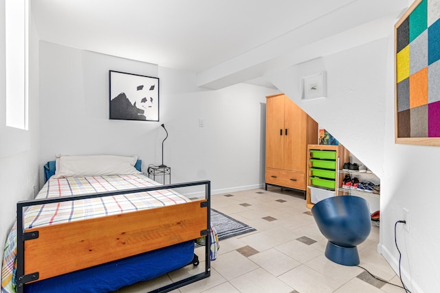 1597 James Ave, Saint Paul, MN 55105 - bedroom featuring baseboards and light tile patterned floors