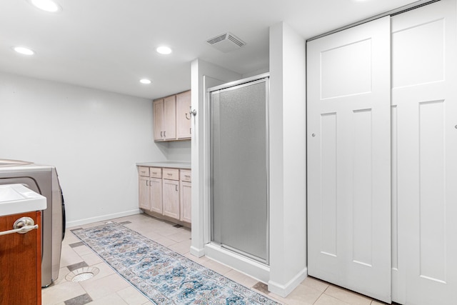 1597 James Ave, Saint Paul, MN 55105 - laundry area with washer and clothes dryer, recessed lighting, baseboards, and light tile patterned flooring