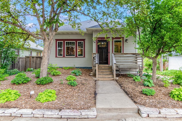 1597 James Ave, Saint Paul, MN 55105 - view of front facade with roof with shingles and covered porch