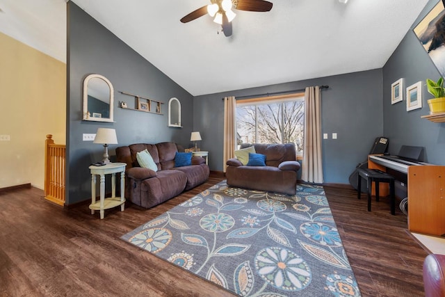 living room featuring lofted ceiling, wood finished floors, and a ceiling fan