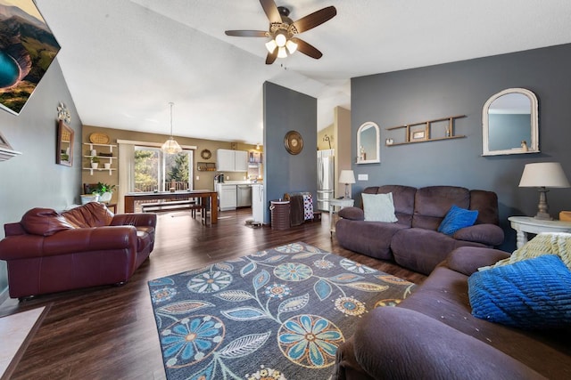 living room with dark wood-style flooring, lofted ceiling, and a ceiling fan