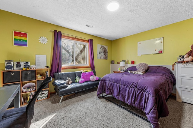 bedroom with carpet, a textured ceiling, and visible vents