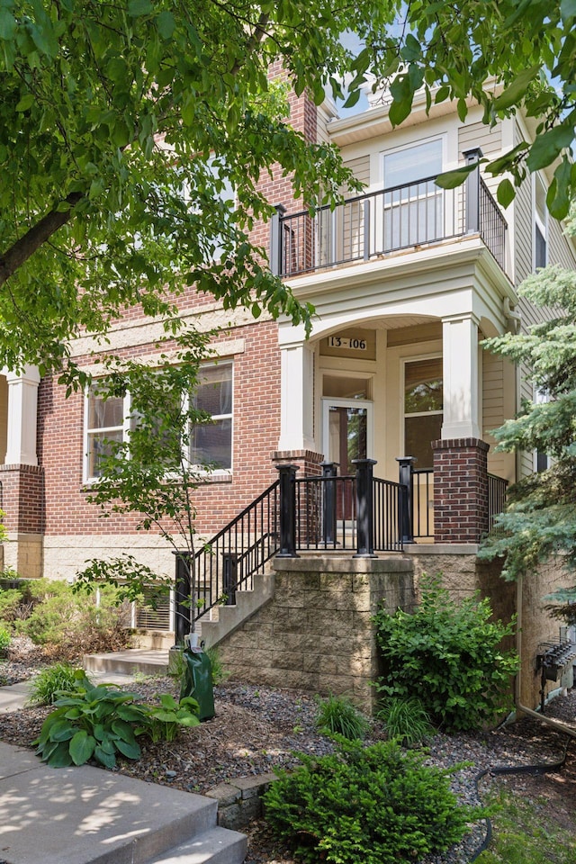 13 4th Ave N Unit 106, Minneapolis, MN 55401 - view of front of house with a balcony and brick siding