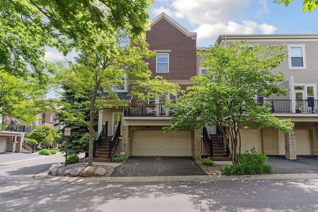 13 4th Ave N Unit 106, Minneapolis, MN 55401 - multi unit property with stairway, brick siding, and an attached garage