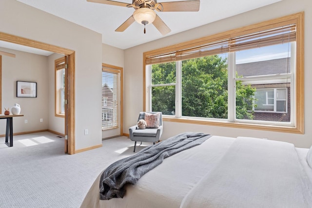 13 4th Ave N Unit 106, Minneapolis, MN 55401 - carpeted bedroom with baseboards and ceiling fan