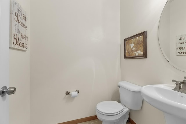 5633 200th St W Unit 1102, Farmington, MN 55024 - half bath with toilet, a sink, and baseboards