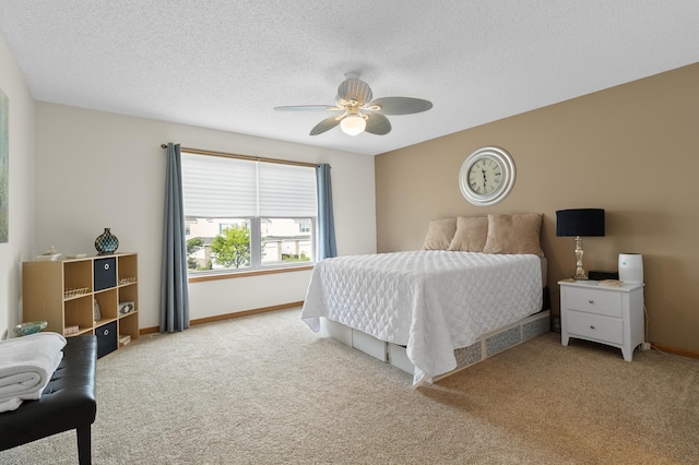 5633 200th St W Unit 1102, Farmington, MN 55024 - carpeted bedroom featuring a textured ceiling, baseboards, and a ceiling fan