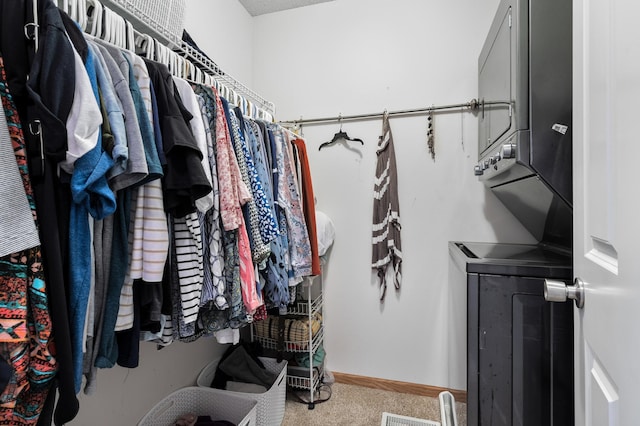 5633 200th St W Unit 1102, Farmington, MN 55024 - walk in closet with stacked washing machine and dryer and carpet