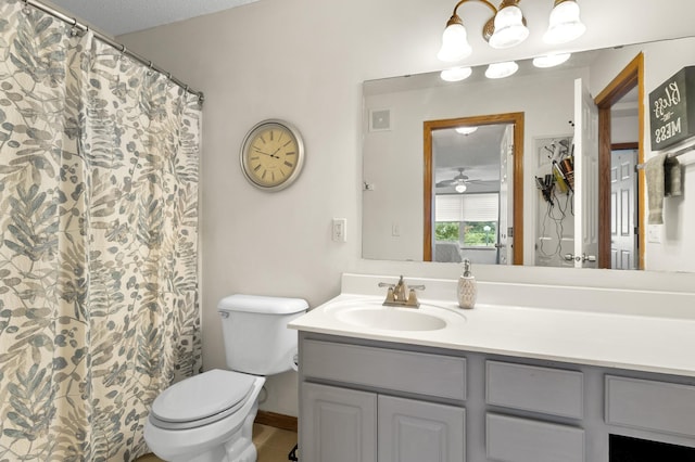 5633 200th St W Unit 1102, Farmington, MN 55024 - full bath with vanity, toilet, tile patterned flooring, and ceiling fan