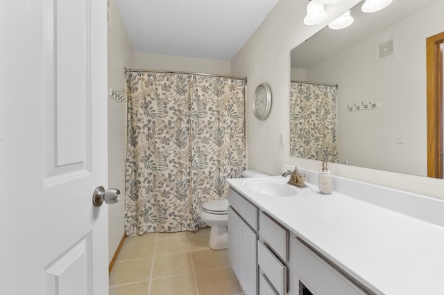 5633 200th St W Unit 1102, Farmington, MN 55024 - bathroom featuring vanity, toilet, tile patterned flooring, and baseboards