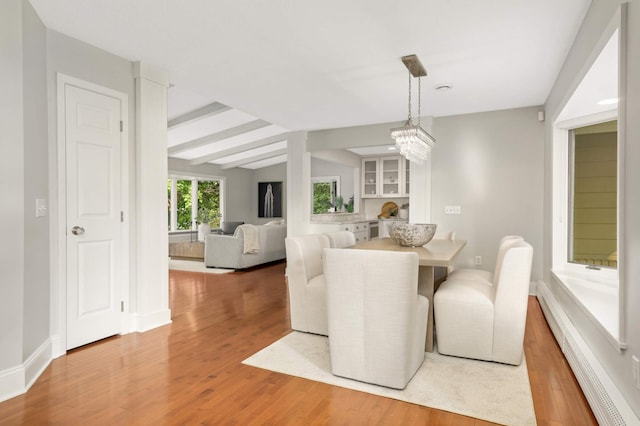 1310 Vine Pl, Orono, MN 55364 - dining area featuring light wood finished floors and baseboards