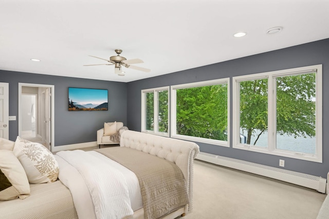 1310 Vine Pl, Orono, MN 55364 - bedroom featuring baseboards, multiple windows, a baseboard heating unit, carpet floors, and recessed lighting