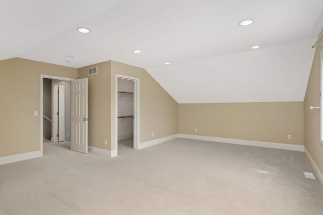 1310 Vine Pl, Orono, MN 55364 - bonus room featuring vaulted ceiling, light colored carpet, recessed lighting, and baseboards