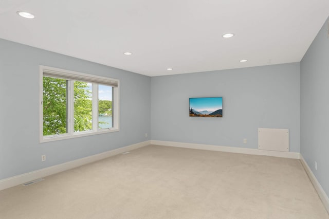 1310 Vine Pl, Orono, MN 55364 - empty room with recessed lighting, light colored carpet, and baseboards