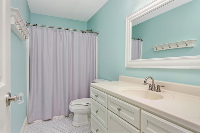 1310 Vine Pl, Orono, MN 55364 - full bathroom with toilet, vanity, tile patterned floors, and a shower with curtain