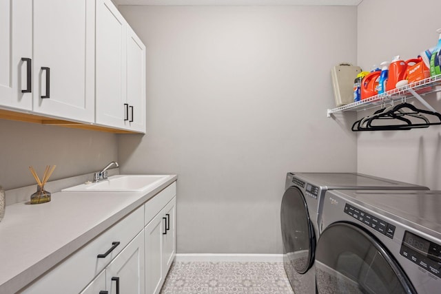 19477 102nd Pl, Corcoran, MN 55374 - laundry room featuring washer and clothes dryer and cabinet space