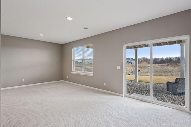 19477 102nd Pl, Corcoran, MN 55374 - empty room with light colored carpet and recessed lighting