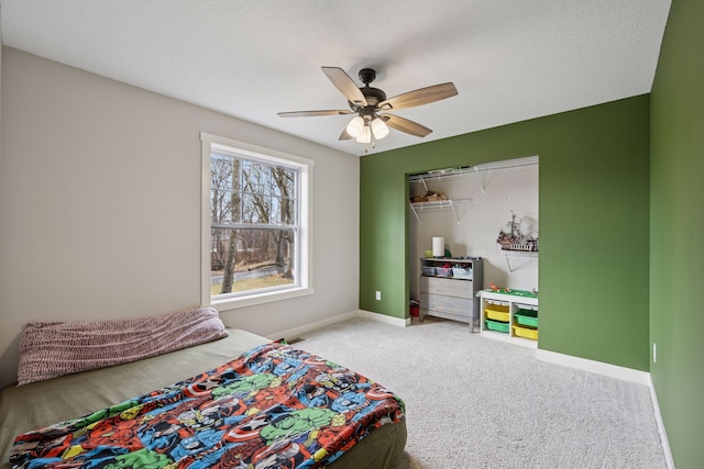 18837 Ogden St NW, Elk River, MN 55330 - bedroom featuring carpet floors, baseboards, and ceiling fan
