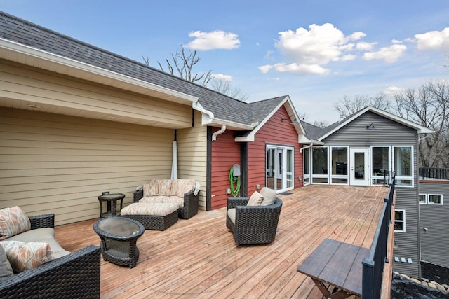 18837 Ogden St NW, Elk River, MN 55330 - wooden deck with an outdoor living space and a sunroom