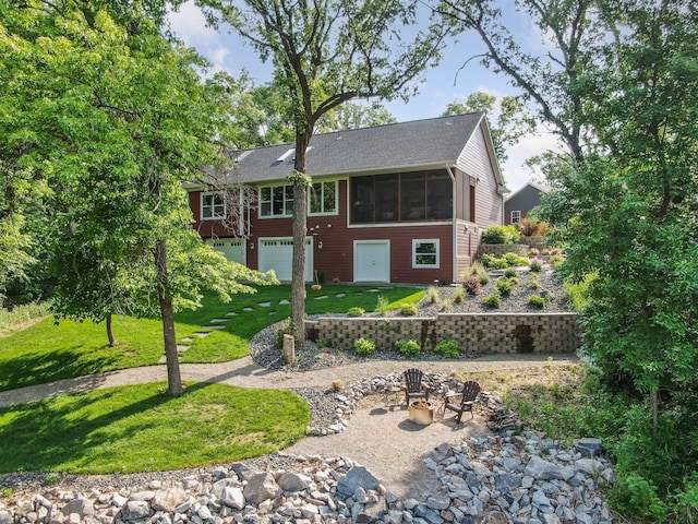 18837 Ogden St NW, Elk River, MN 55330 - view of front of property featuring a sunroom and a front yard