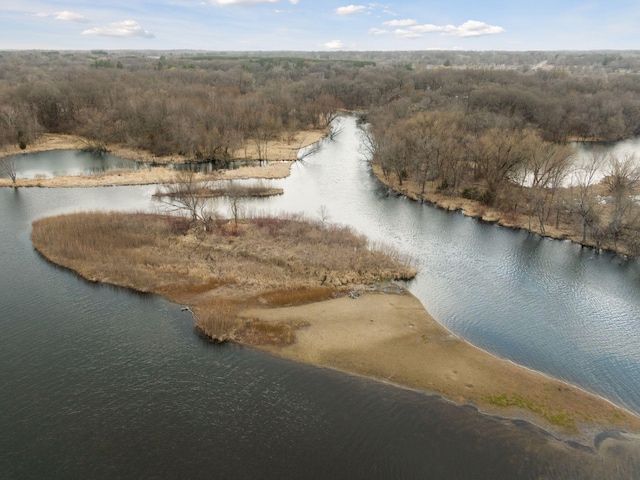 18837 Ogden St NW, Elk River, MN 55330 - aerial overview of property's location with a large body of water and a heavily wooded area