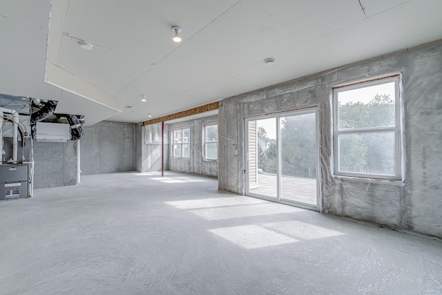 15485 Jersey Ave S, Savage, MN 55378 - empty room featuring concrete flooring