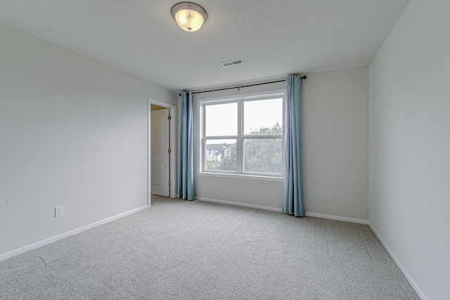 15485 Jersey Ave S, Savage, MN 55378 - spare room with carpet flooring, baseboards, and a textured ceiling