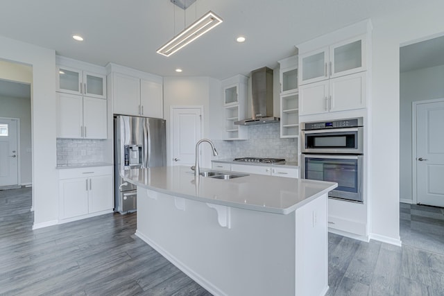 15485 Jersey Ave S, Savage, MN 55378 - kitchen featuring a sink, appliances with stainless steel finishes, wall chimney exhaust hood, open shelves, and light wood finished floors