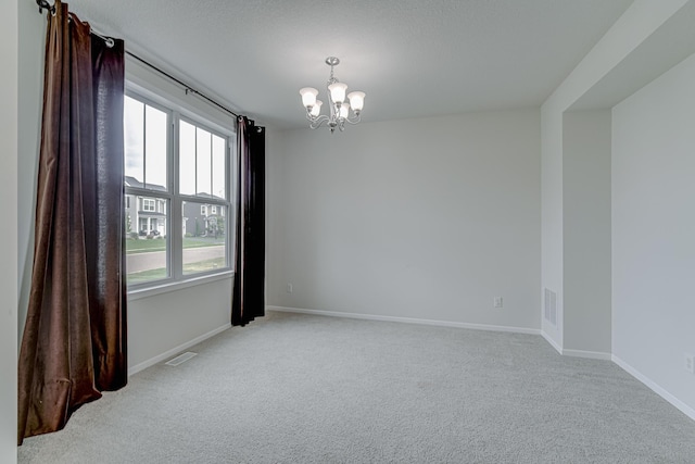 15485 Jersey Ave S, Savage, MN 55378 - spare room with a chandelier, light carpet, and baseboards