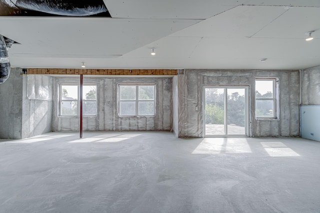 15485 Jersey Ave S, Savage, MN 55378 - empty room with concrete flooring