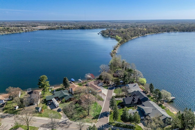 bird's eye view featuring a residential view and a water view