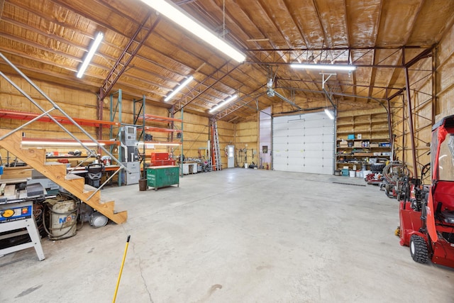garage with a workshop area