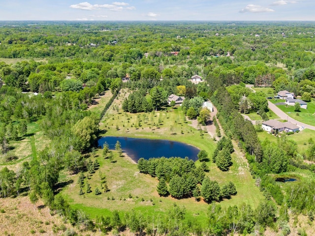 aerial view with a view of trees and a water view