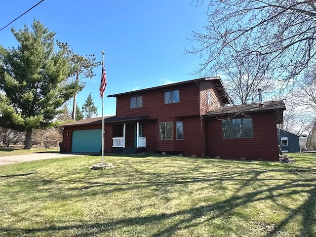318 Pine Ave S, Sandstone, MN 55072 - traditional home featuring a garage, a front yard, and concrete driveway