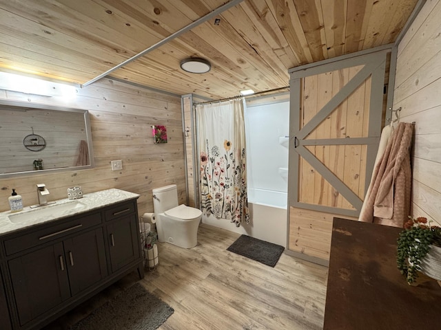 318 Pine Ave S, Sandstone, MN 55072 - bathroom with wooden walls, wood finished floors, toilet, shower / bath combo with shower curtain, and wood ceiling