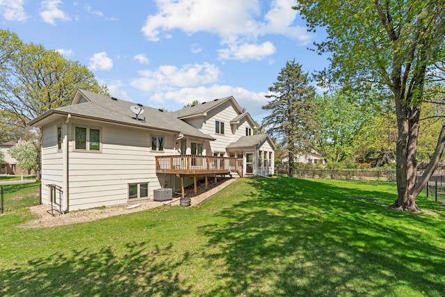 back of house featuring a wooden deck, central air condition unit, and a shingled roof