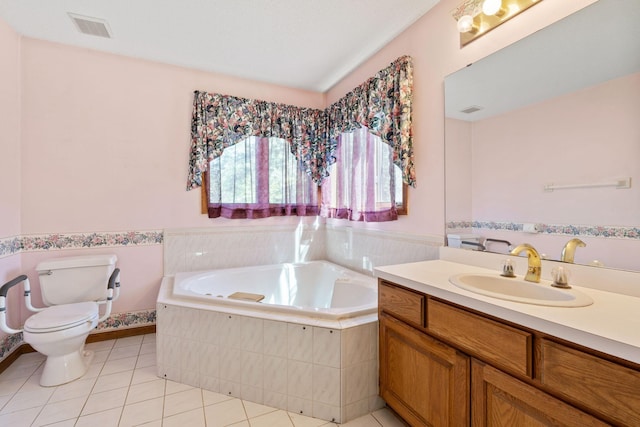 bathroom with a garden tub, tile patterned flooring, toilet, and vanity