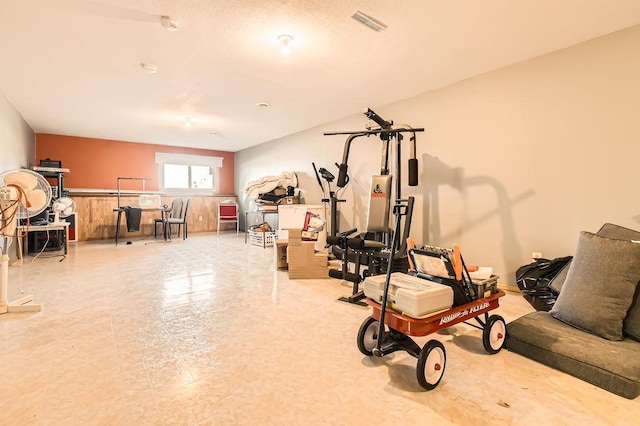 workout area featuring visible vents