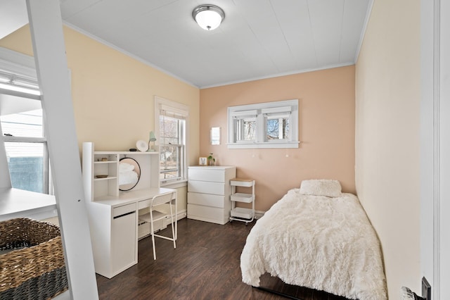 bedroom featuring ornamental molding and dark wood-style flooring