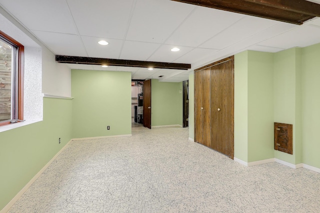 finished basement featuring recessed lighting and baseboards