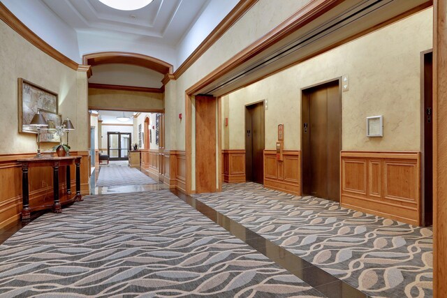500 Grant St Unit 1711, Minneapolis, MN 55404 - hallway featuring wainscoting, elevator, and tile patterned floors